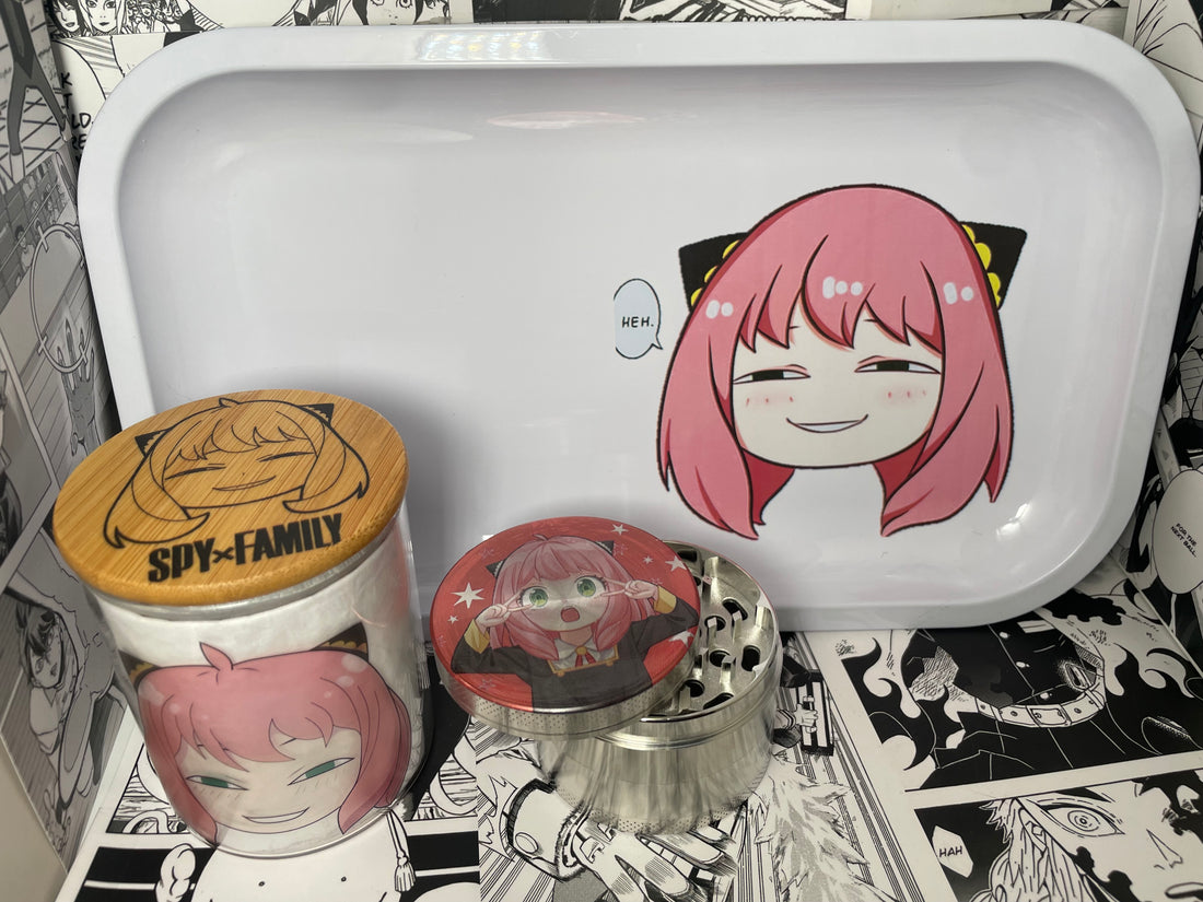 The SpicedAnime Anya Grinder, Jar, Rolling Tray Set showcases Anya from Spy x Family with pink hair and manga panels—ideal for storing jars or grinders.