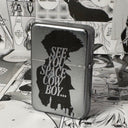 A flip lighter with an anime design, predominantly silver in color with a black and white illustration of spike spiegel from cowboy bebeop silhouetted against a city scape