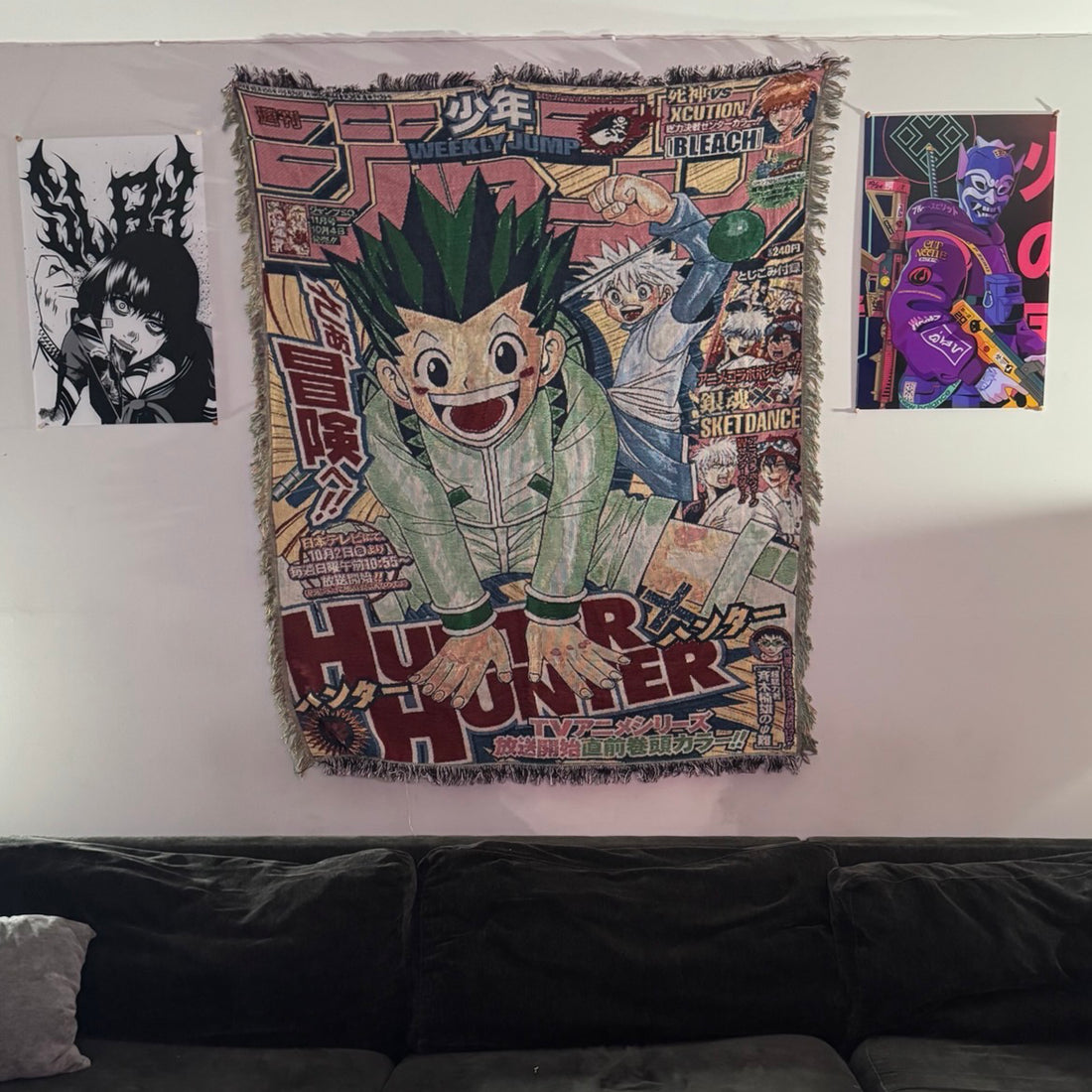 The Hunter X Hunter Anime Hand Woven Cozy Rug by SpicedAnime features vibrant manga cover art of Gon Freecss with bold Japanese text—ideal as a unique anime gift, tapestry throw, or cozy blanket for your home.
